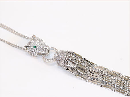 Platinum panther face sleek tassel pendant