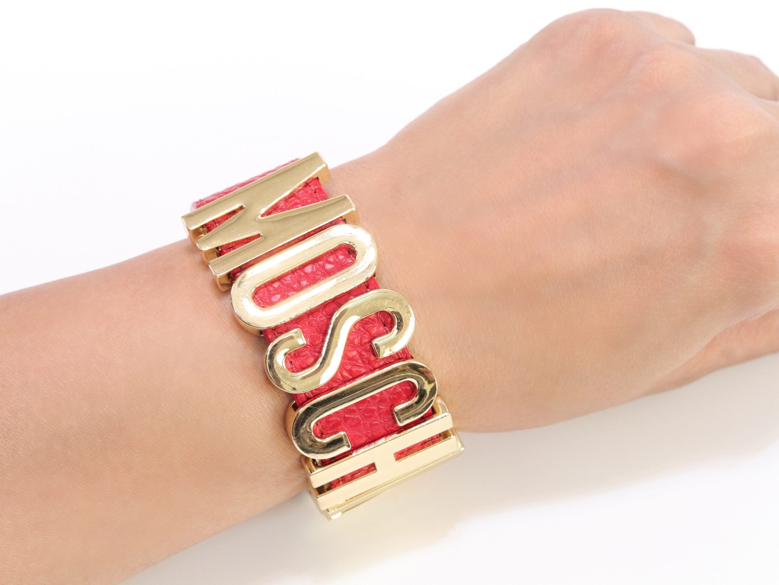 Alphabet M red colour bracelet in gold finish