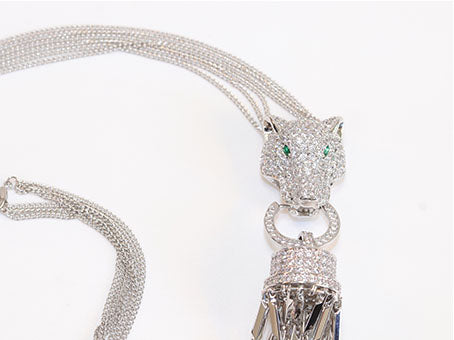 Platinum panther face sleek tassel pendant