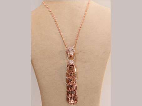 Rose gold panther face sleek tassel pendant