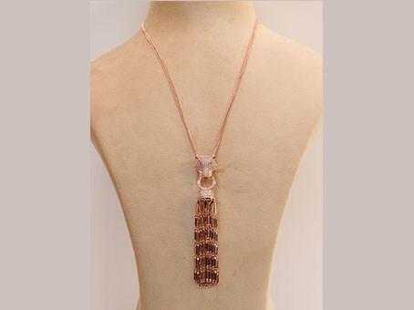 Rose gold panther face sleek tassel pendant