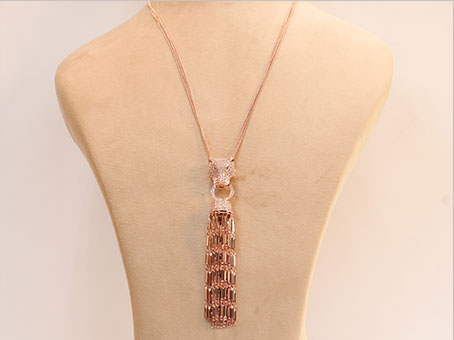 Rose gold panther face sleek tassel pendant