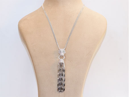 Platinum panther face sleek tassel pendant