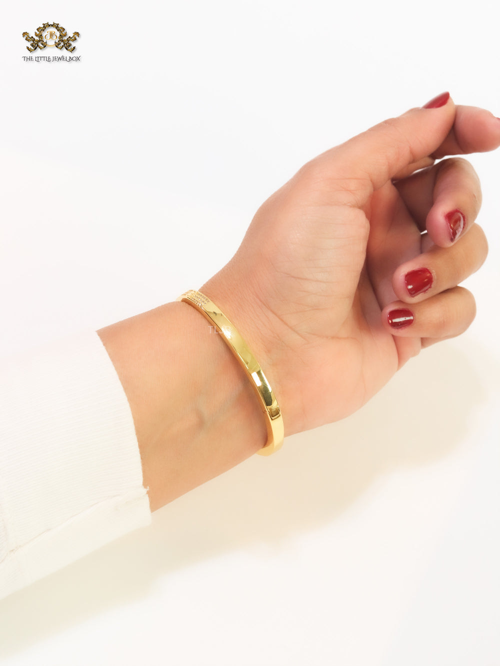 Panther heads gold and emerald bracelet