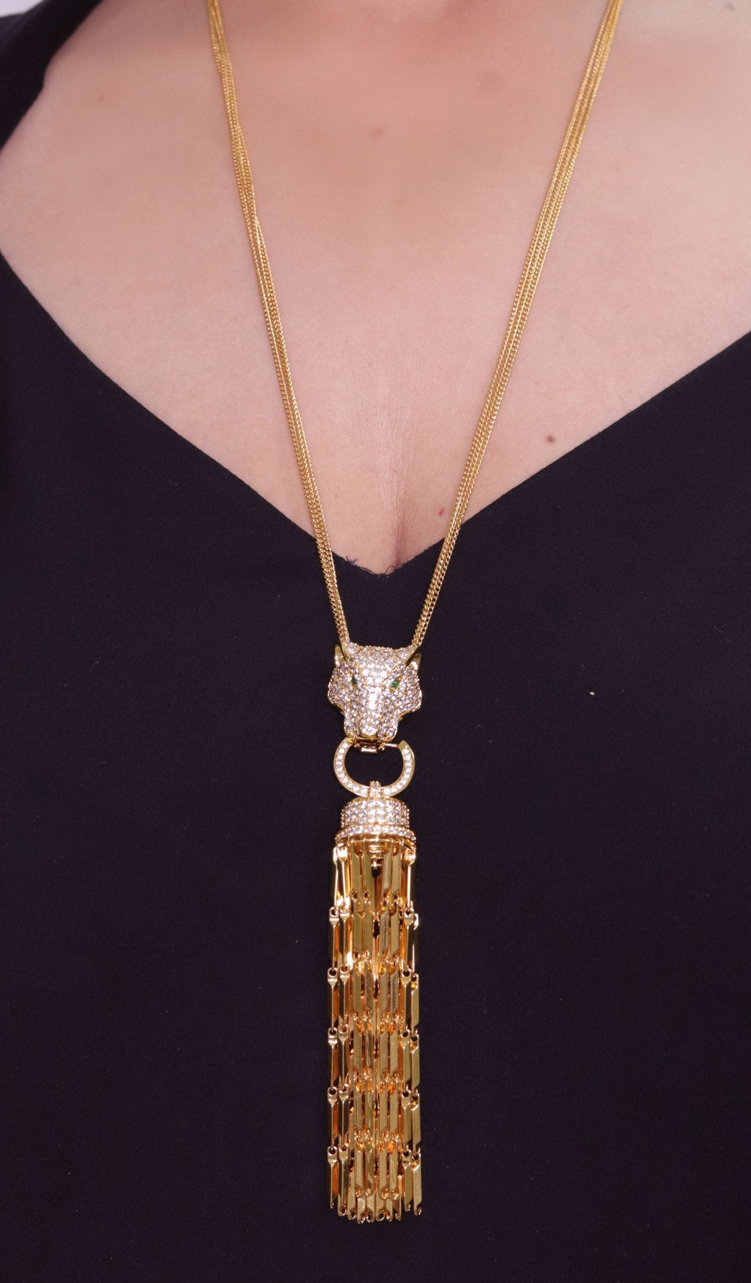 Gold panther face sleek tassel pendant