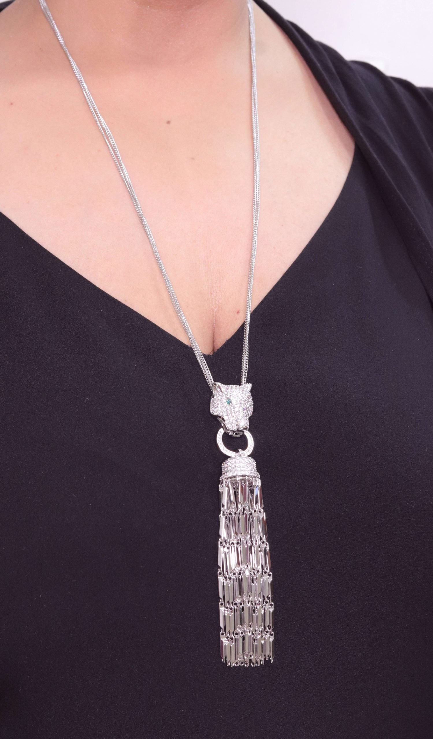 Platinum panther face sleek tassel pendant