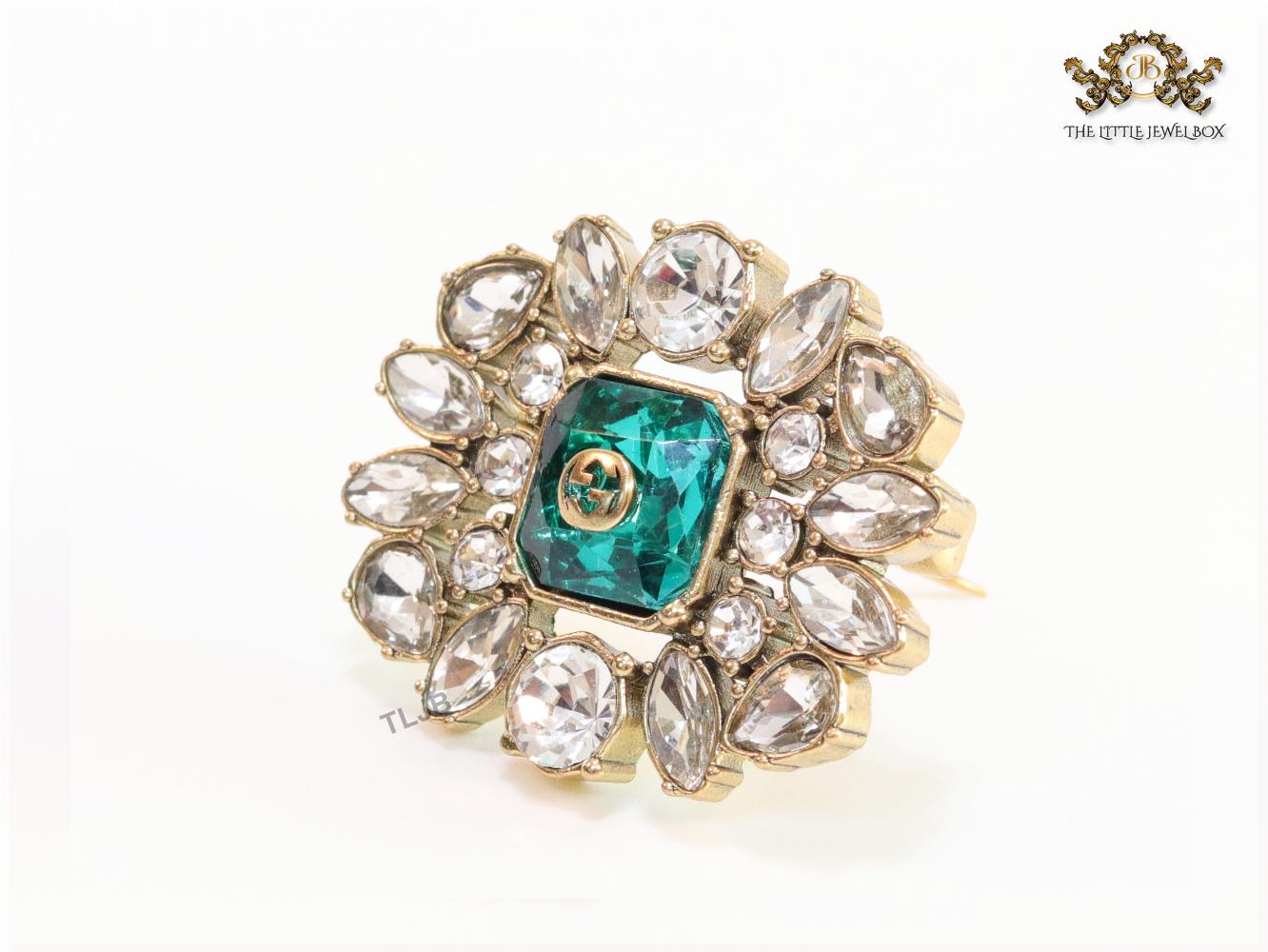 Emerald green stone and double G cz brooch