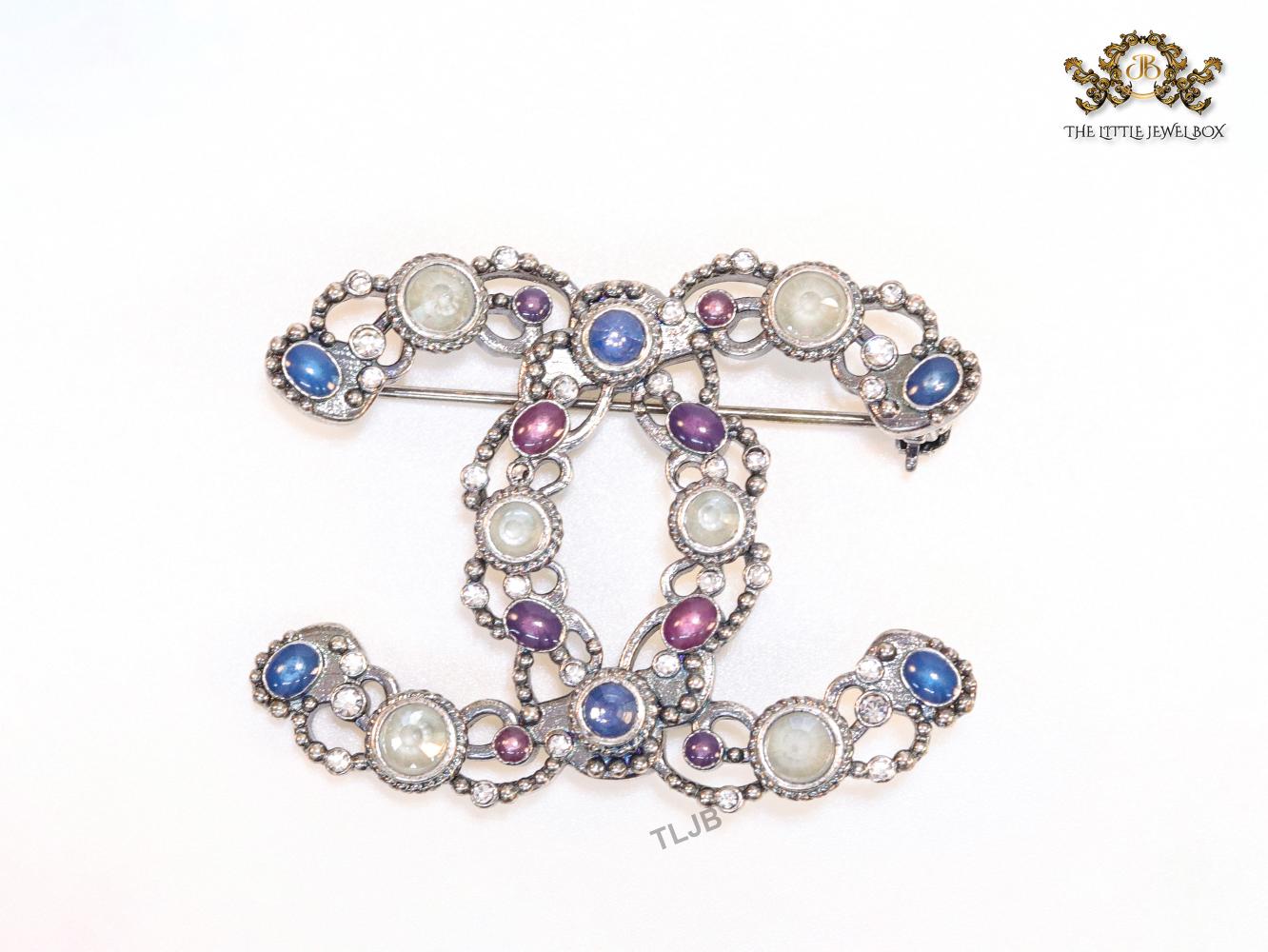Antique platinum finish double C brooch with multi coloured stones