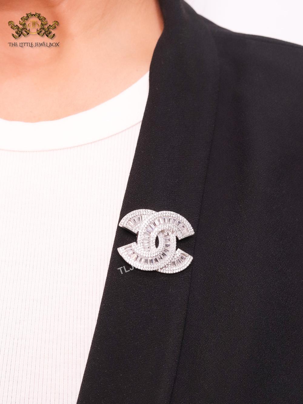 Double C platinum baguette brooch