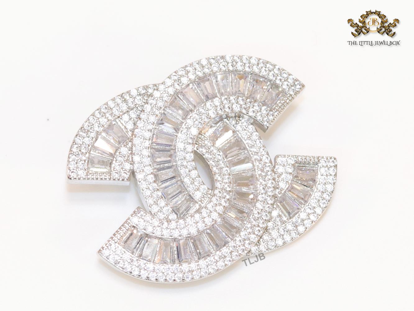 Double C platinum baguette brooch