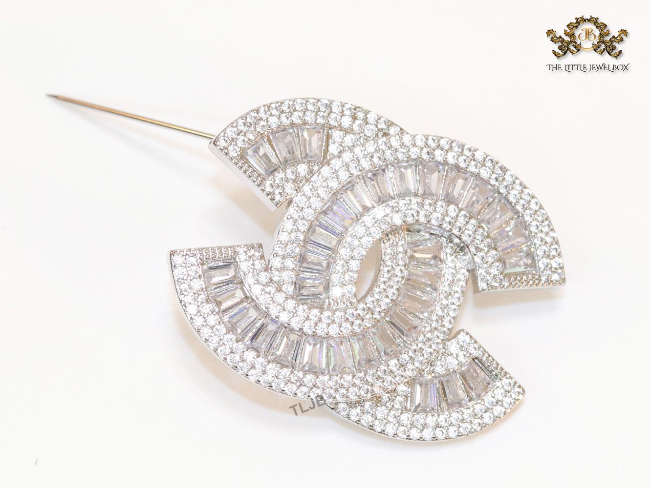 Double C platinum baguette brooch