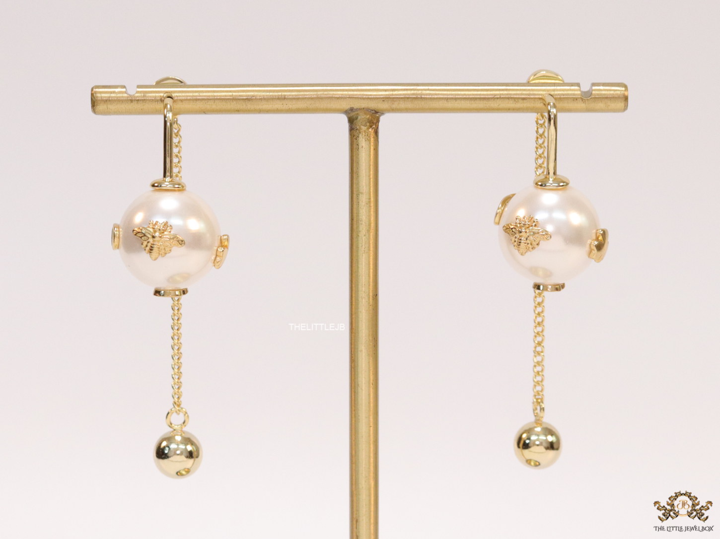 Detachable long chain pearl dangles in gold plating