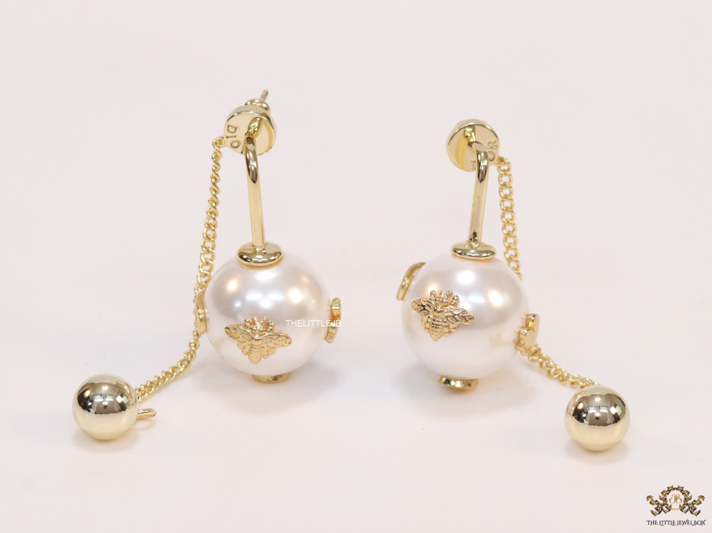 Detachable long chain pearl dangles in gold plating