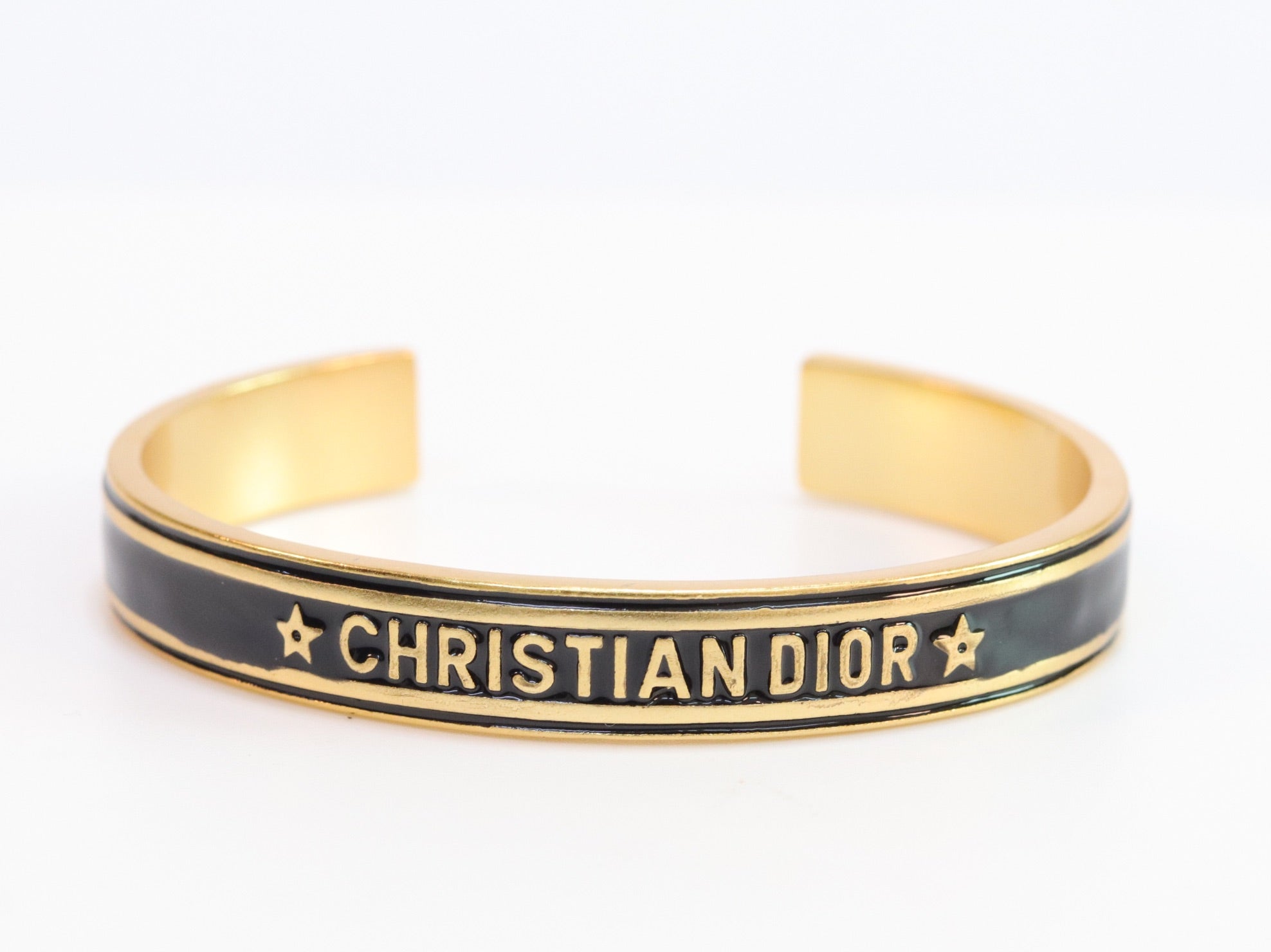 Alphabet C & D black open bracelet in gold finish