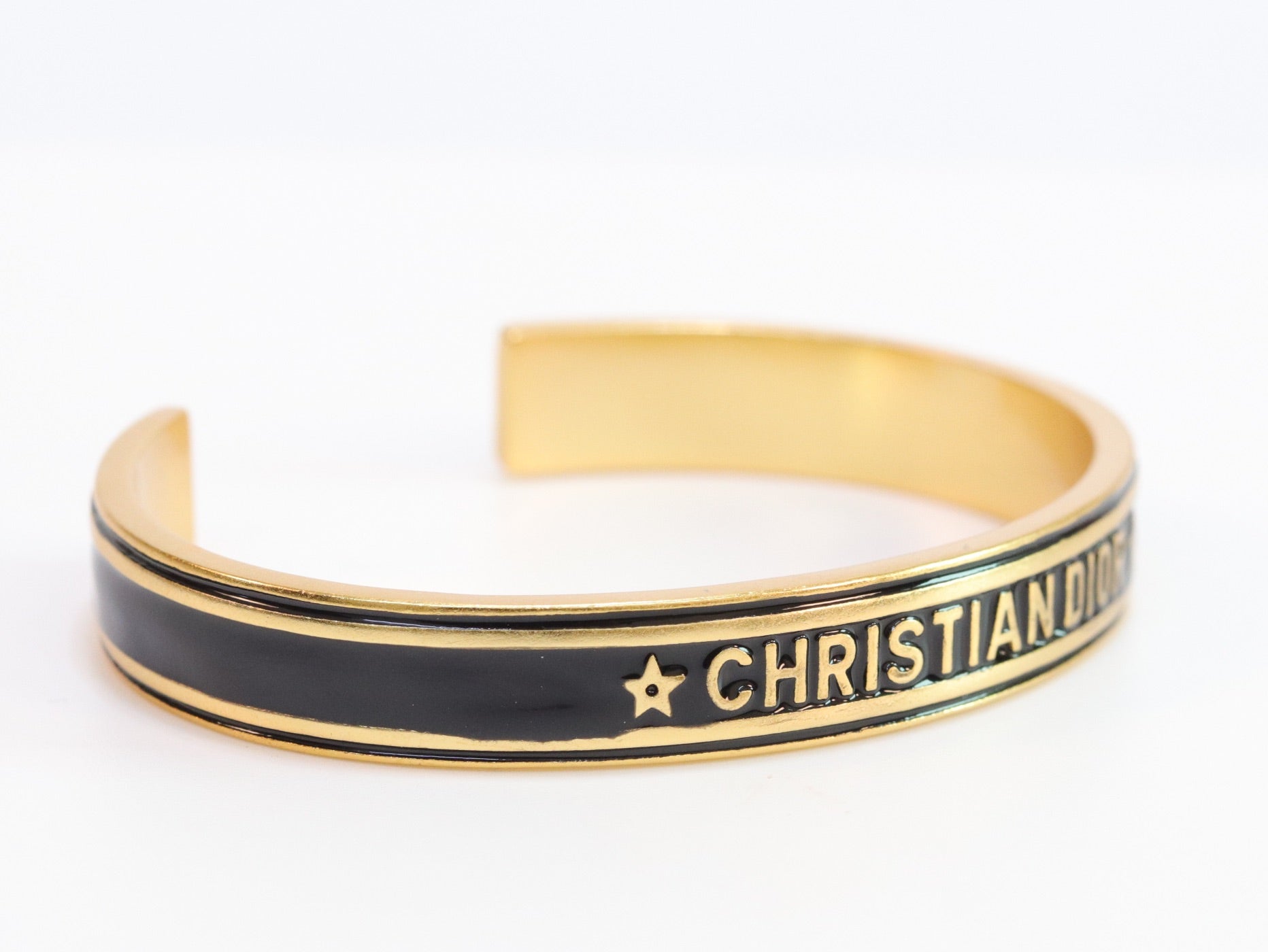 Alphabet C & D black open bracelet in gold finish