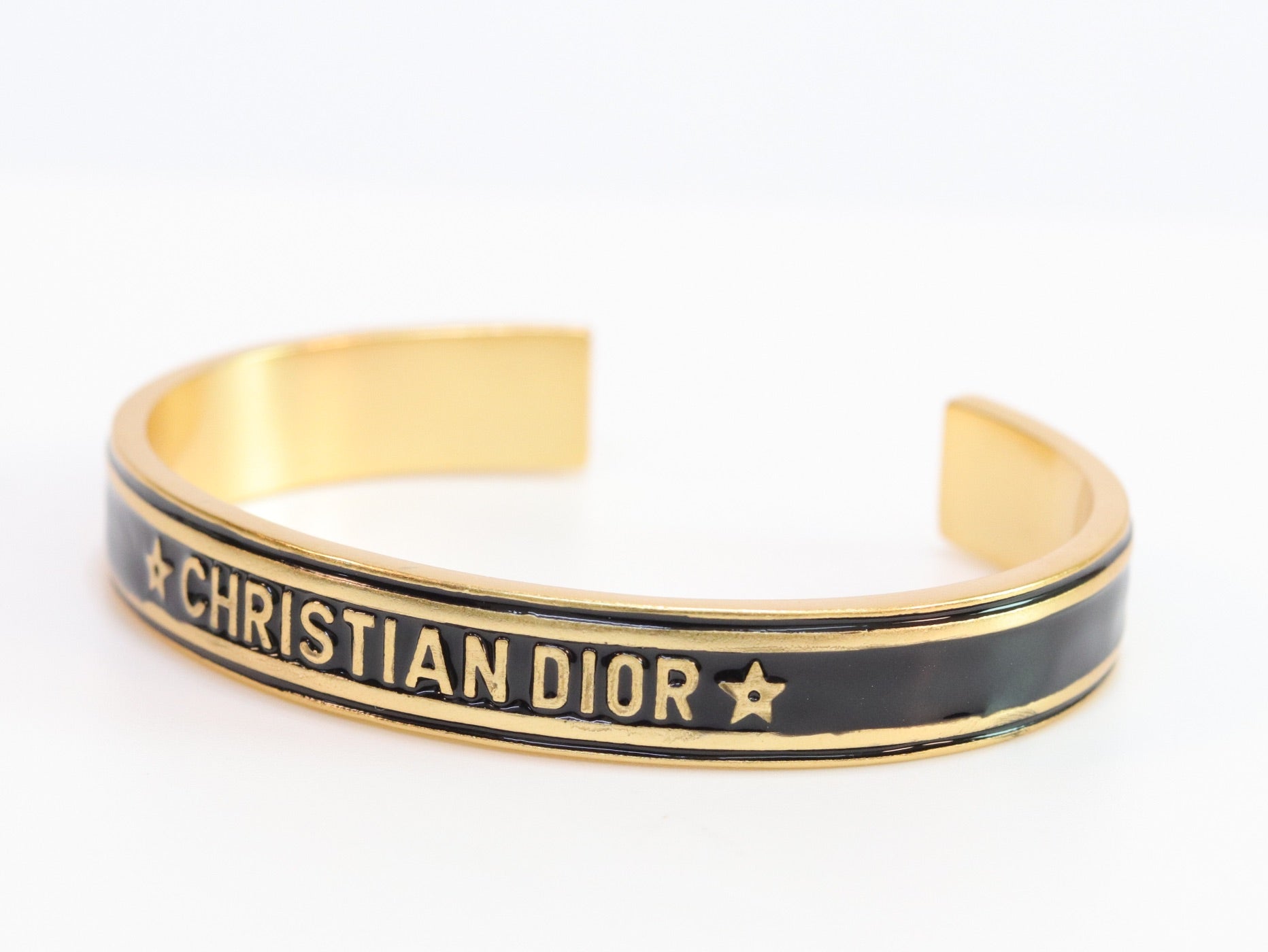 Alphabet C & D black open bracelet in gold finish