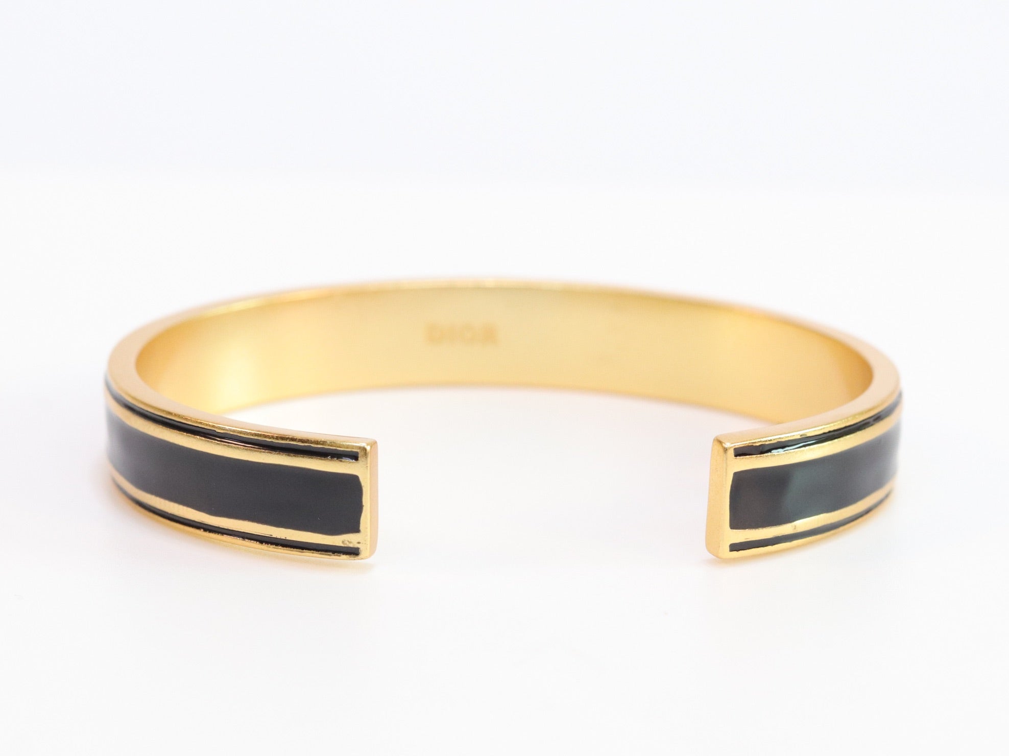 Alphabet C & D black open bracelet in gold finish