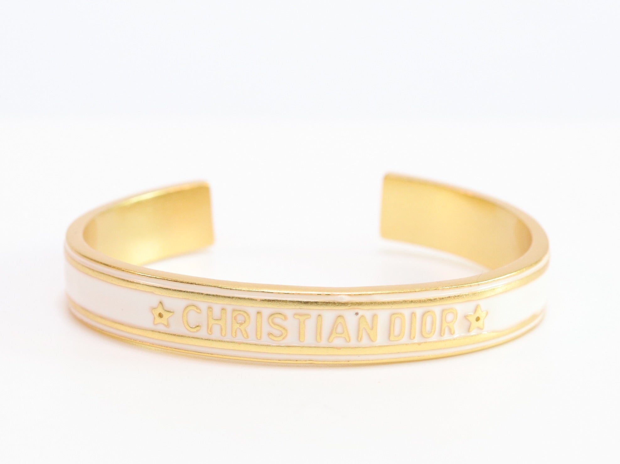 Alphabet C & D white open bracelet in gold finish