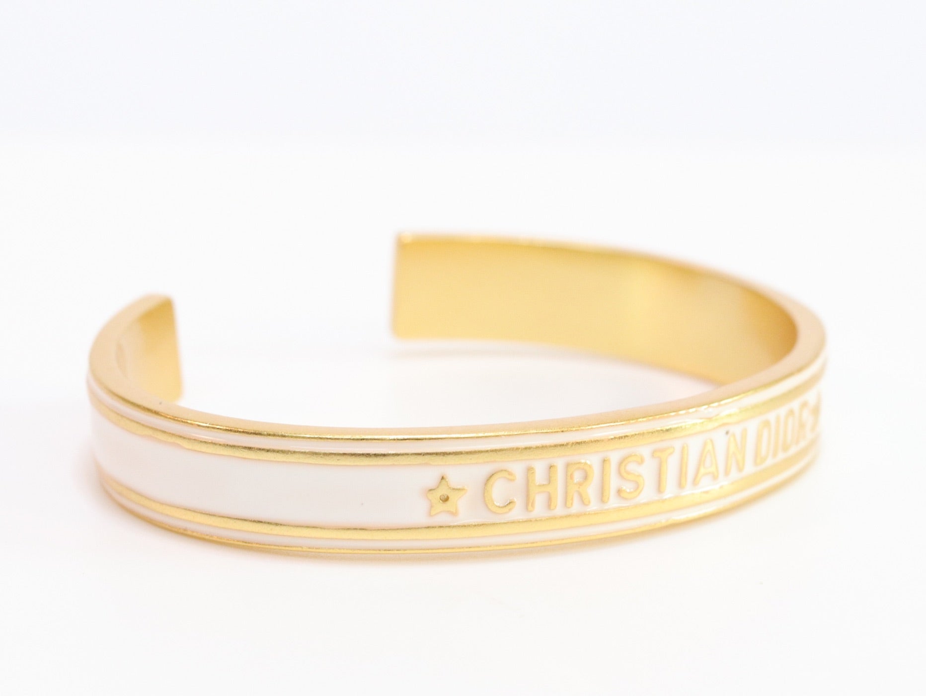 Alphabet C & D white open bracelet in gold finish