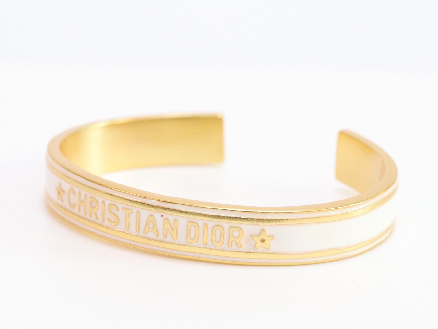 Alphabet C & D white open bracelet in gold finish