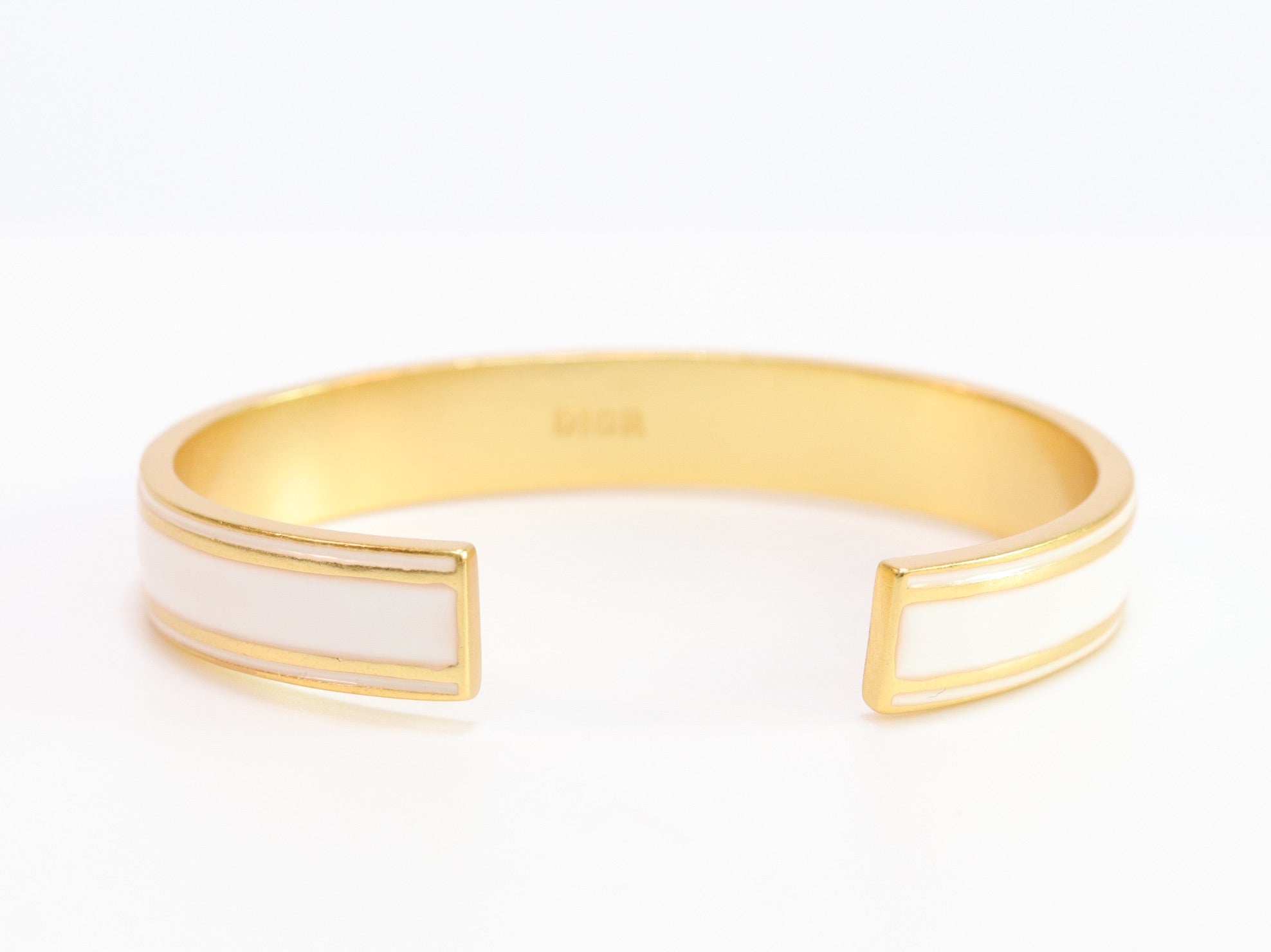 Alphabet C & D white open bracelet in gold finish