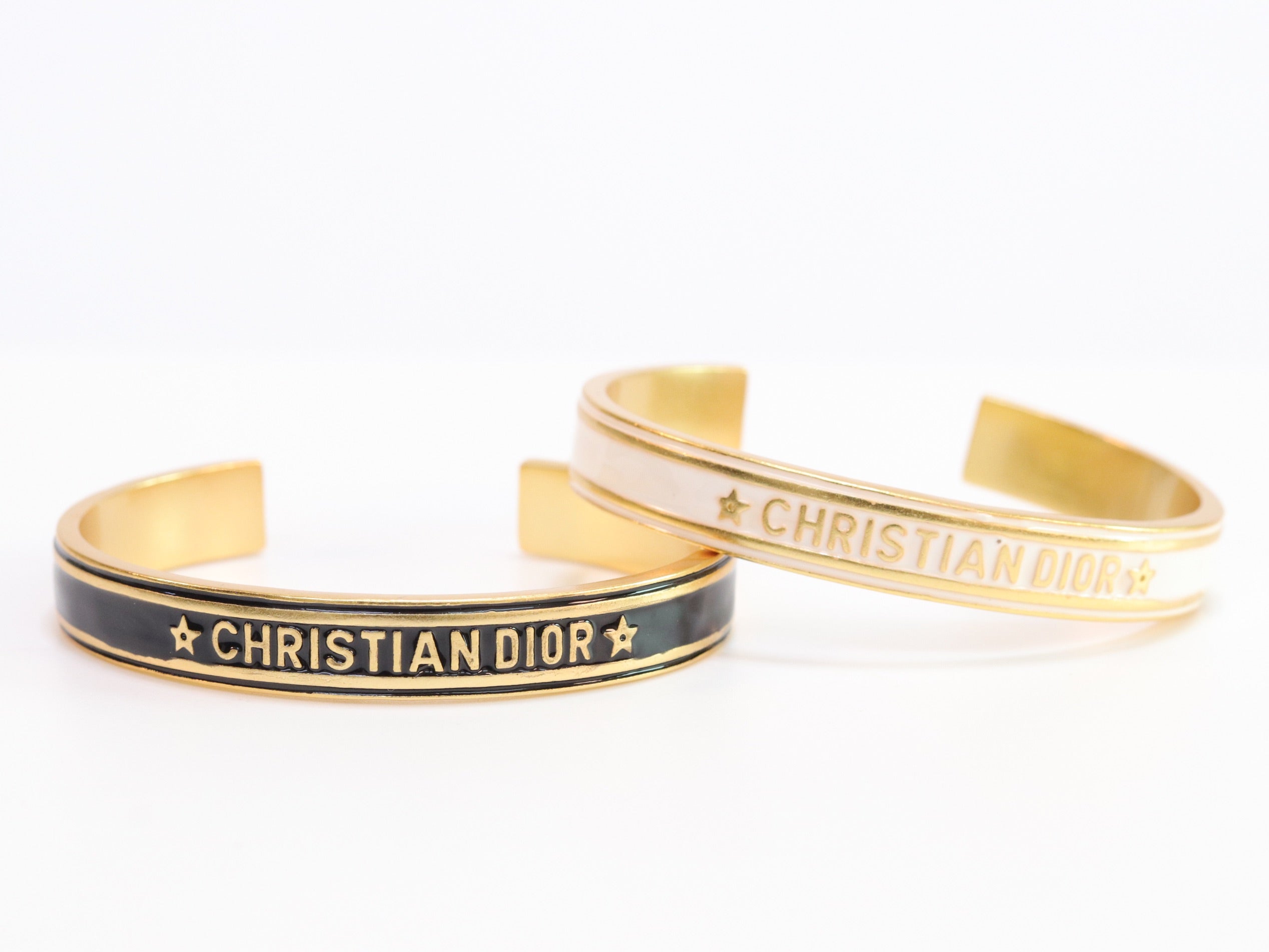 Alphabet C & D black open bracelet in gold finish