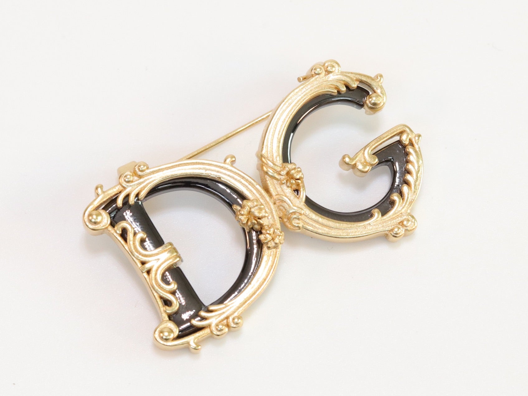 Alphabet D G gold plated brooch