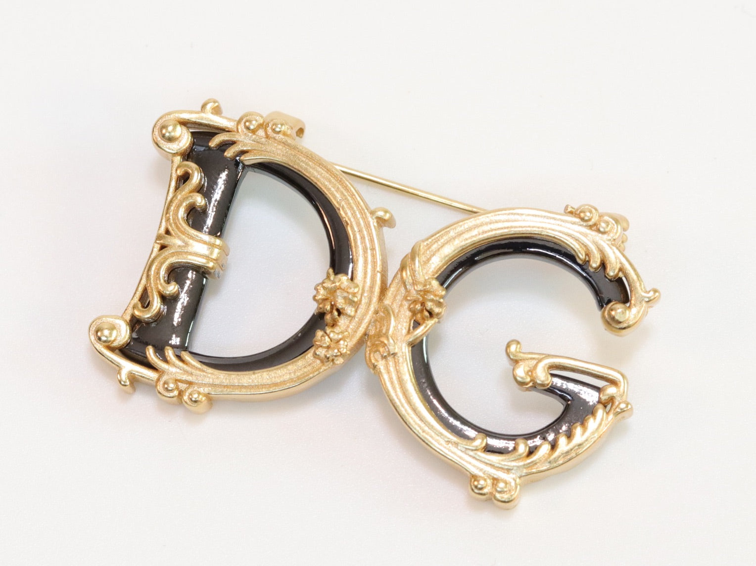 Alphabet D G gold plated brooch