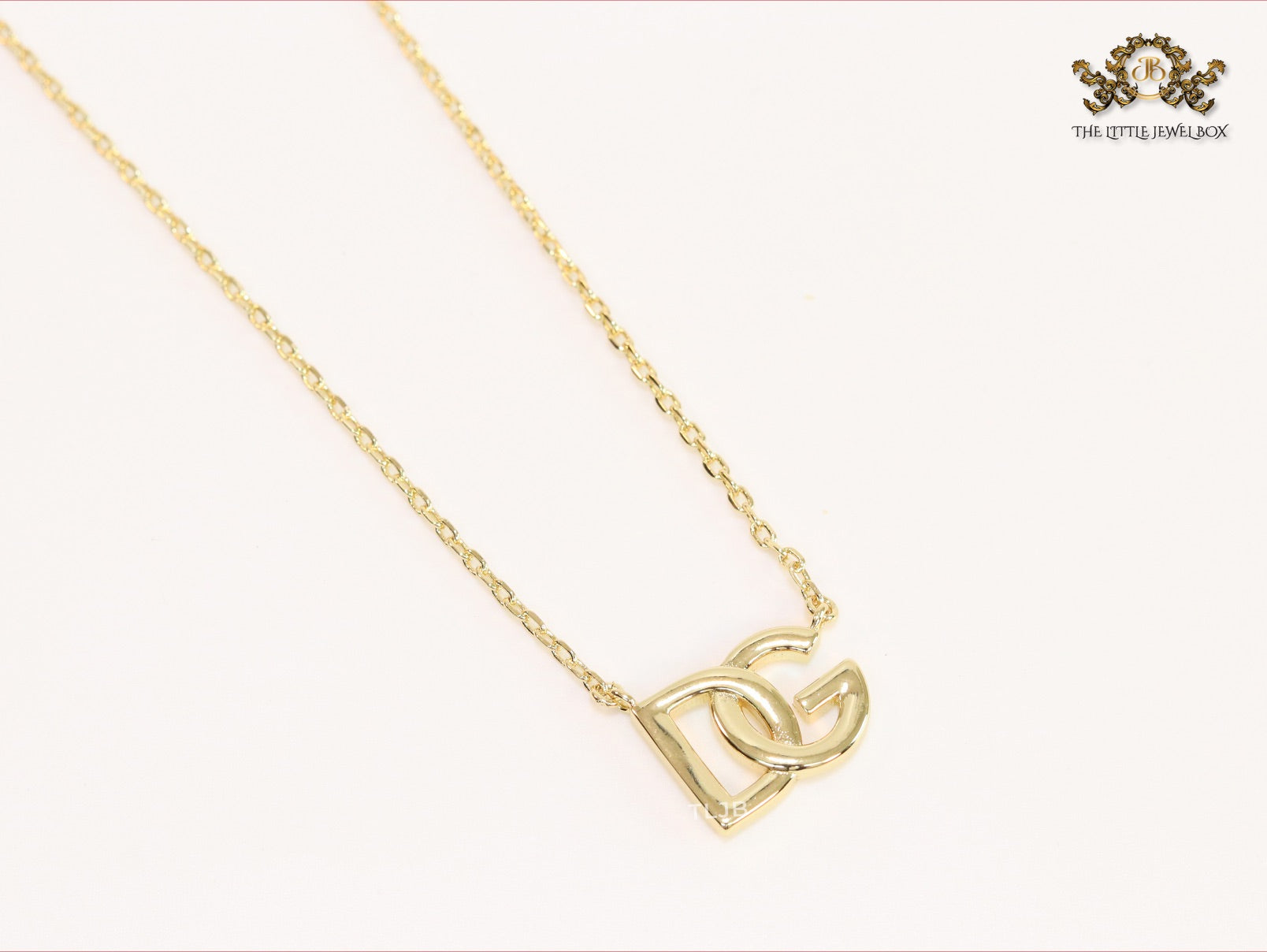 Alphabet D and G gold chain