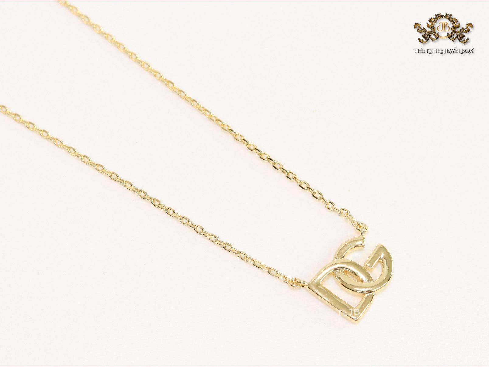Alphabet D and G gold chain