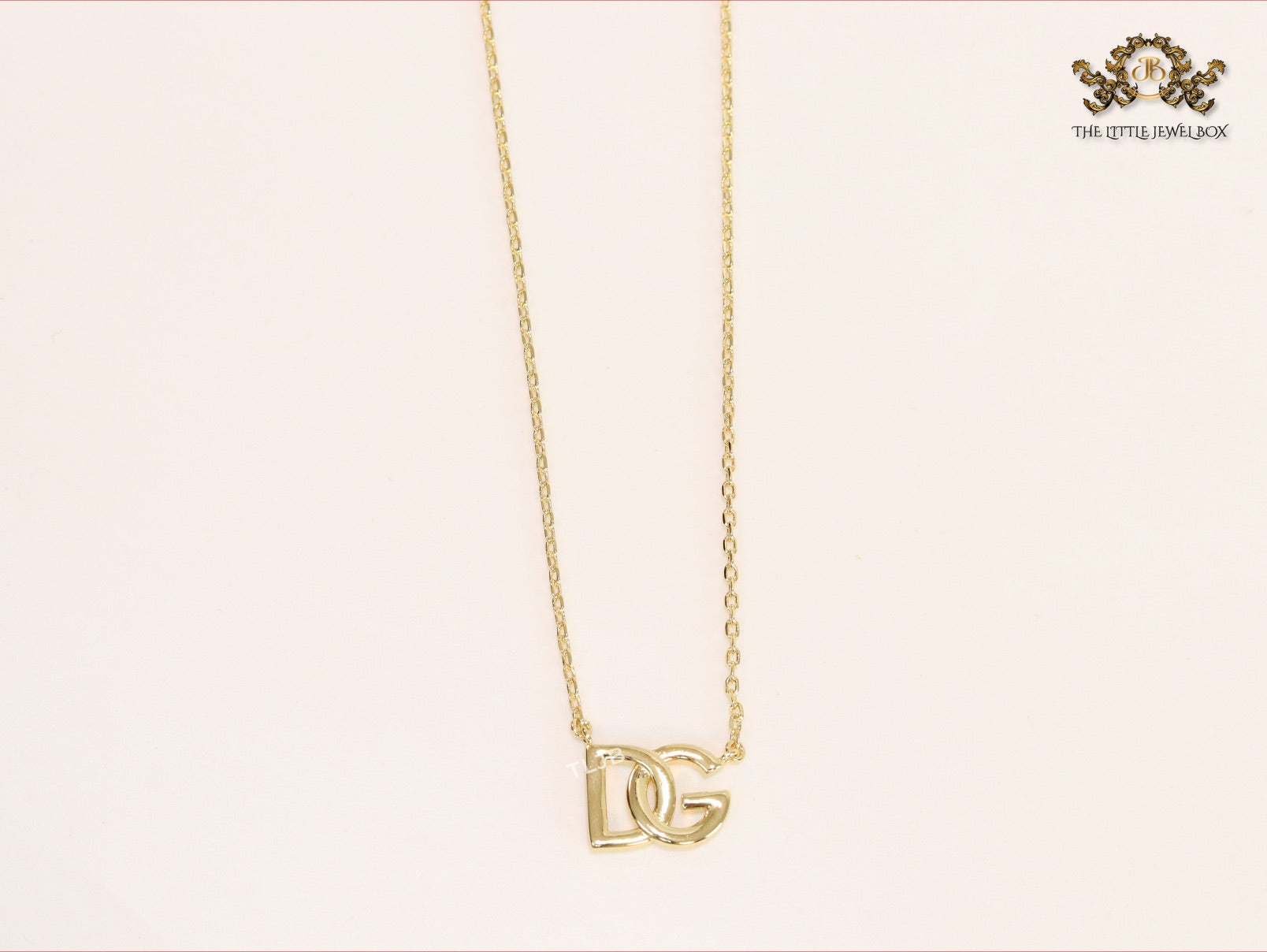 Alphabet D and G gold chain