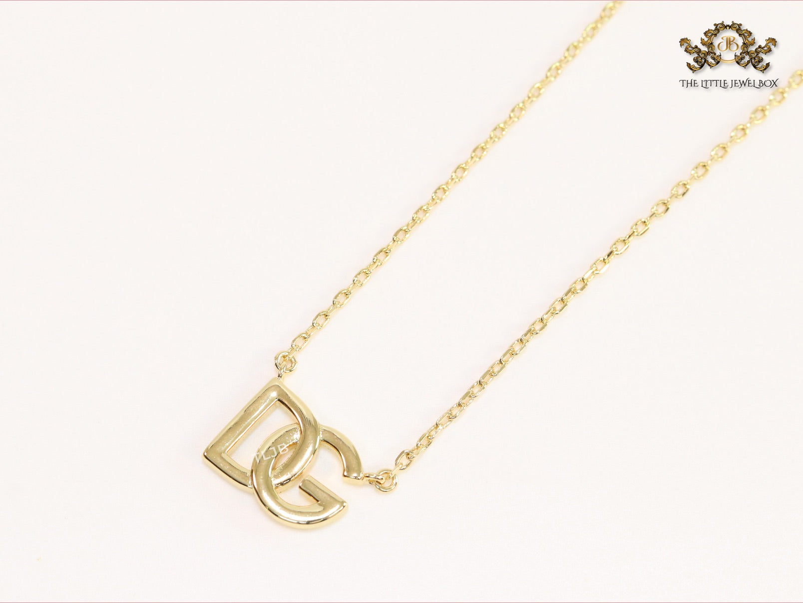 Alphabet D and G gold chain