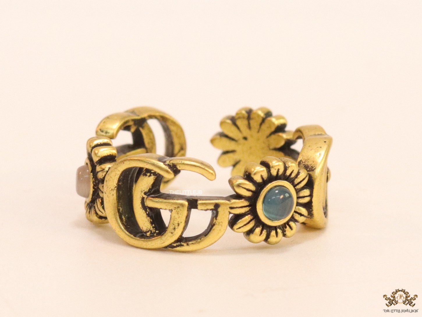 Gold plated twin G motif open ring