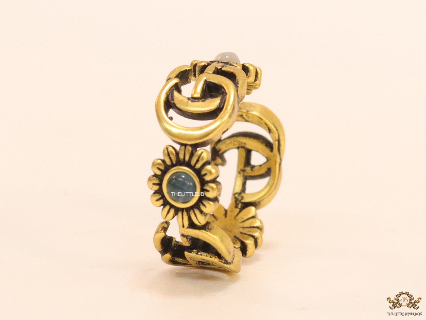 Gold plated twin G motif open ring