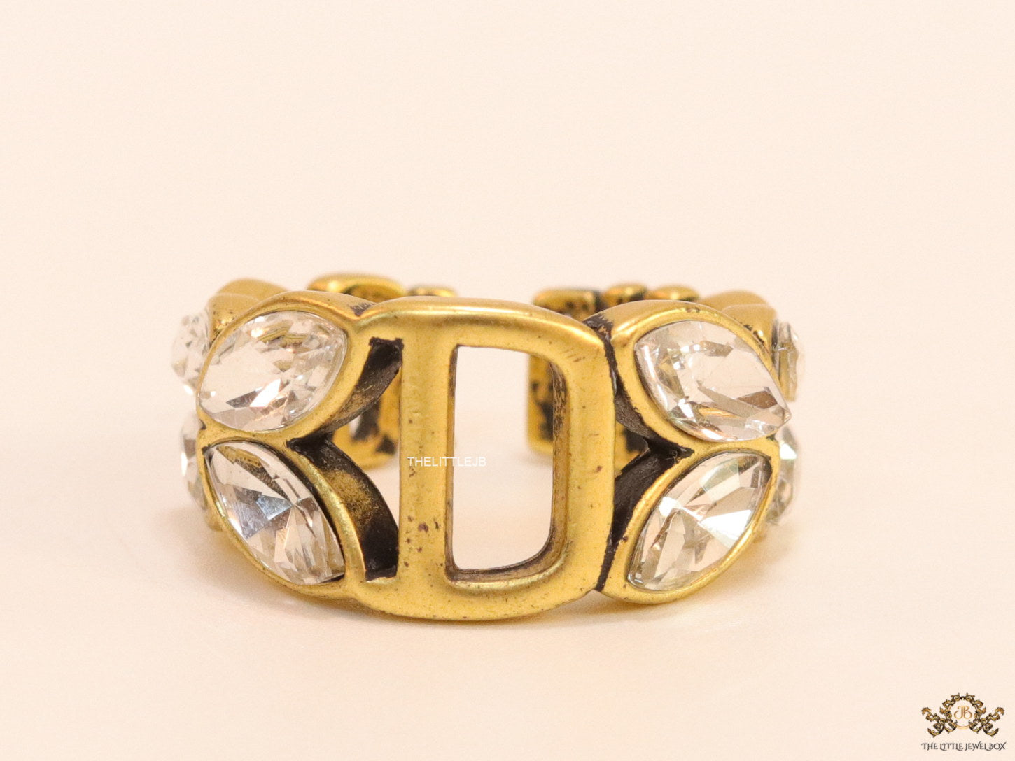 Open golden D alphabet ring with fancy cz