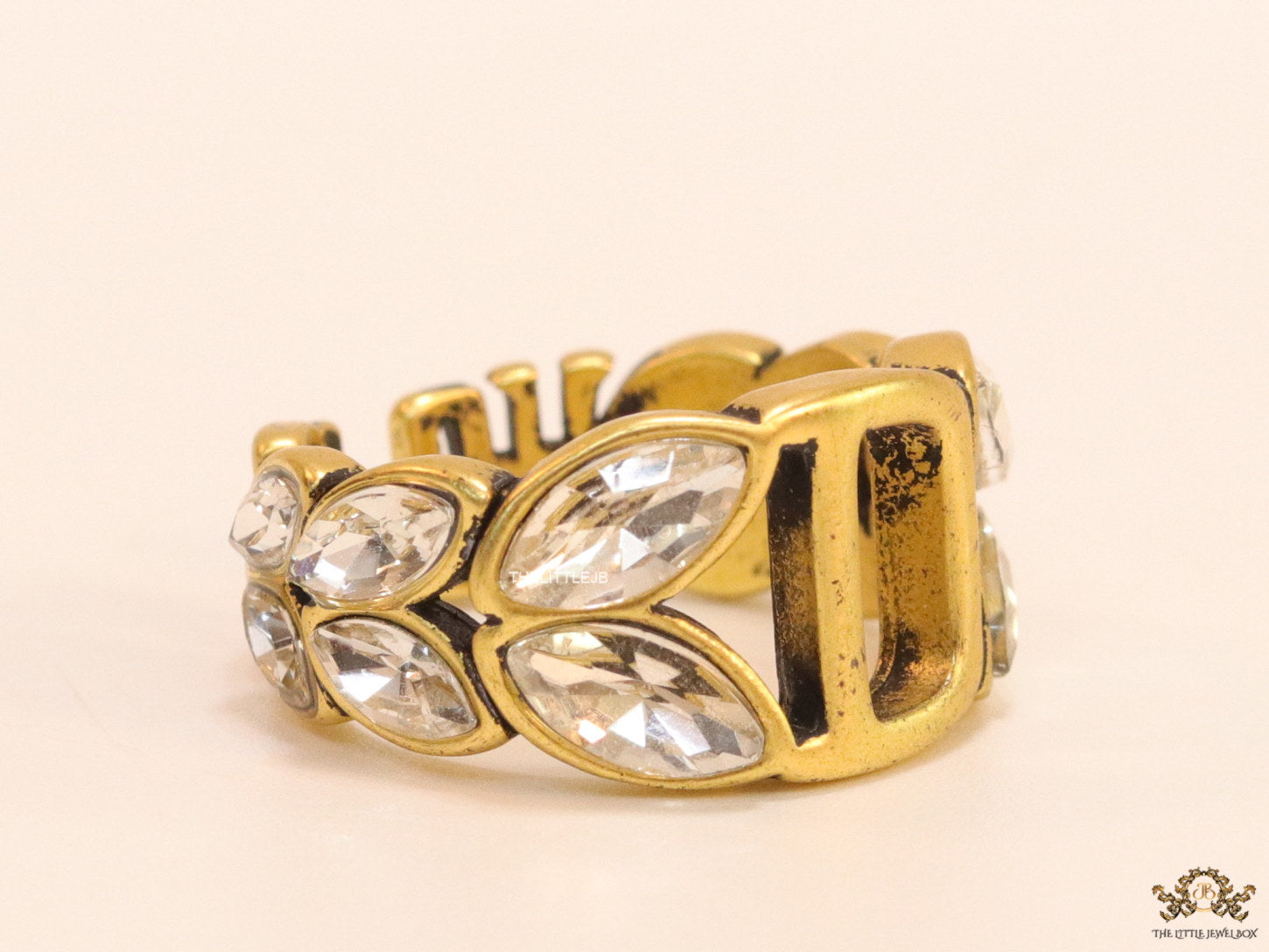 Open golden D alphabet ring with fancy cz
