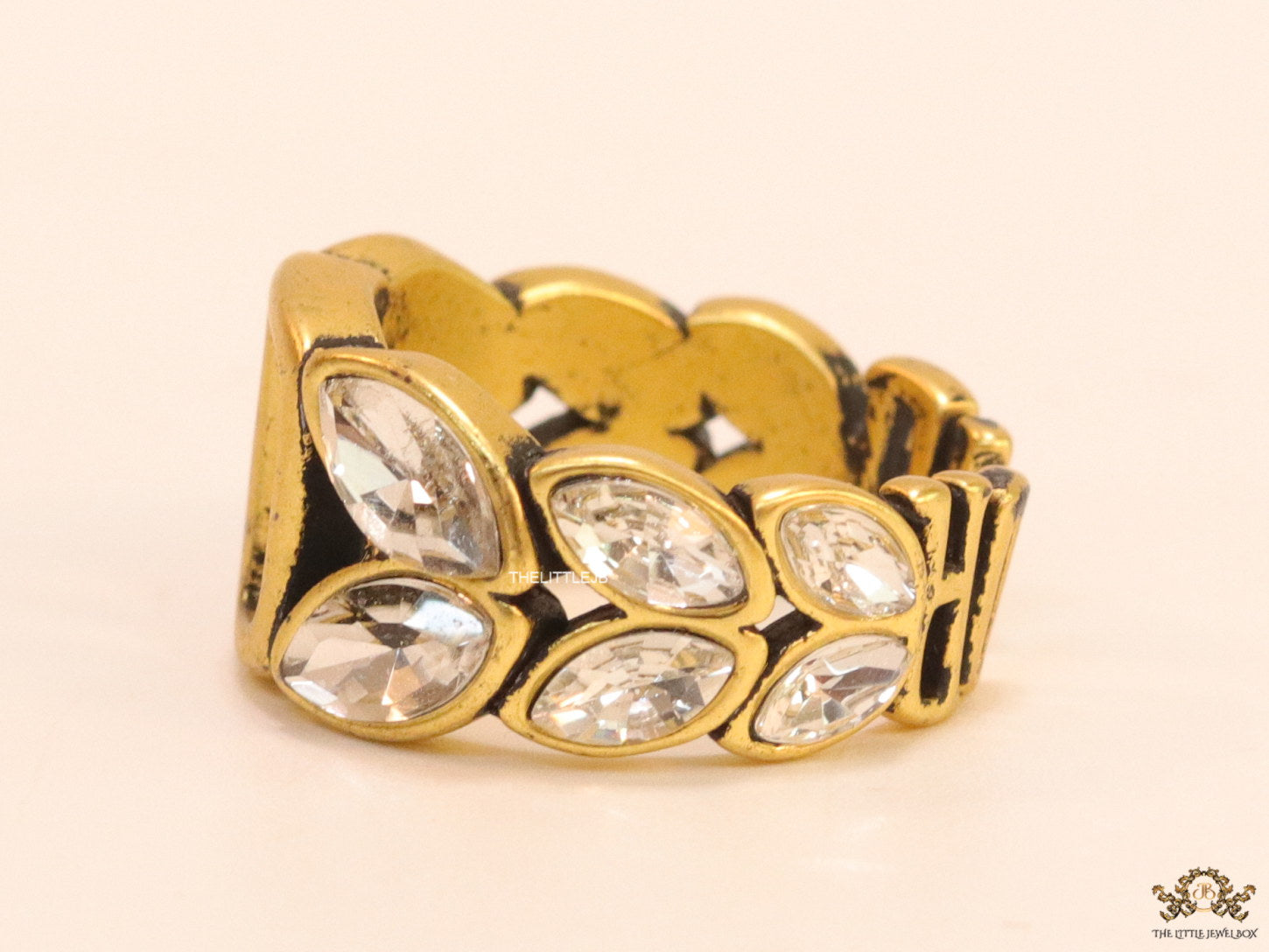 Open golden D alphabet ring with fancy cz