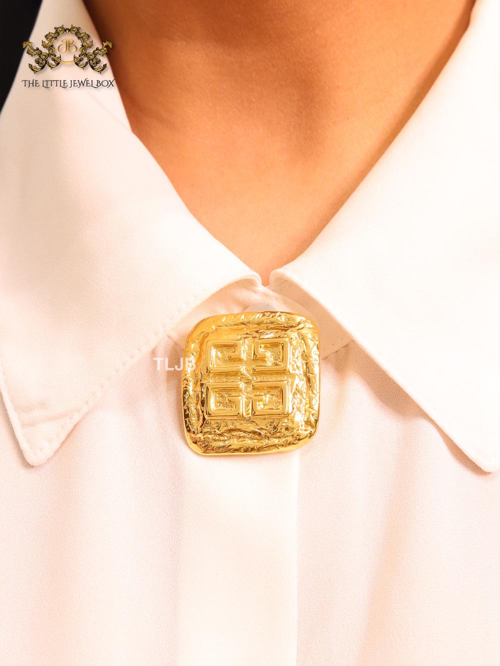 Small brass gold brooch