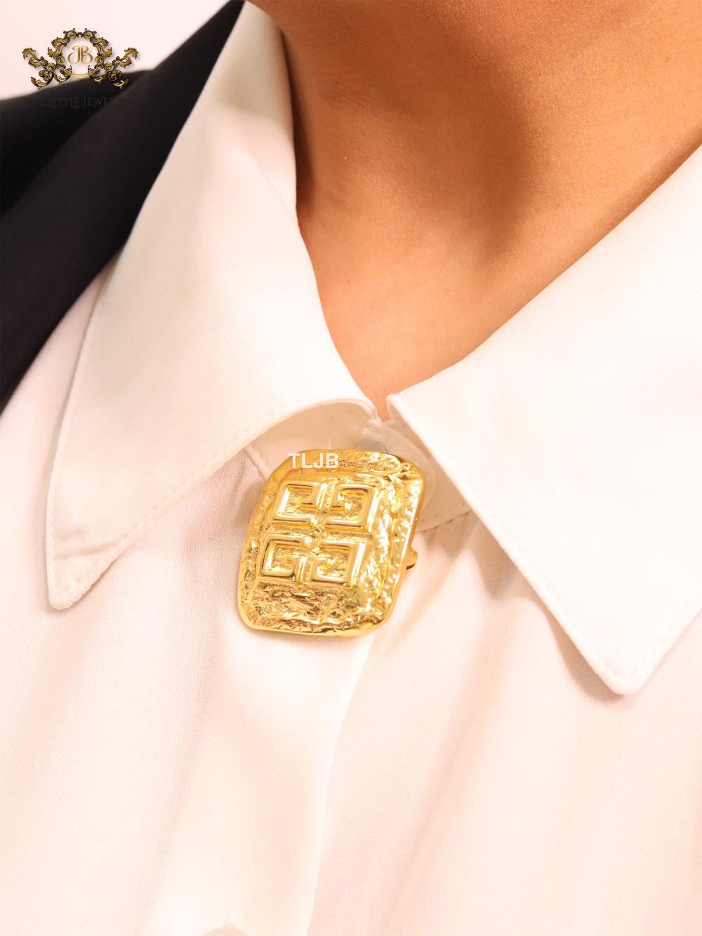 Small brass gold brooch