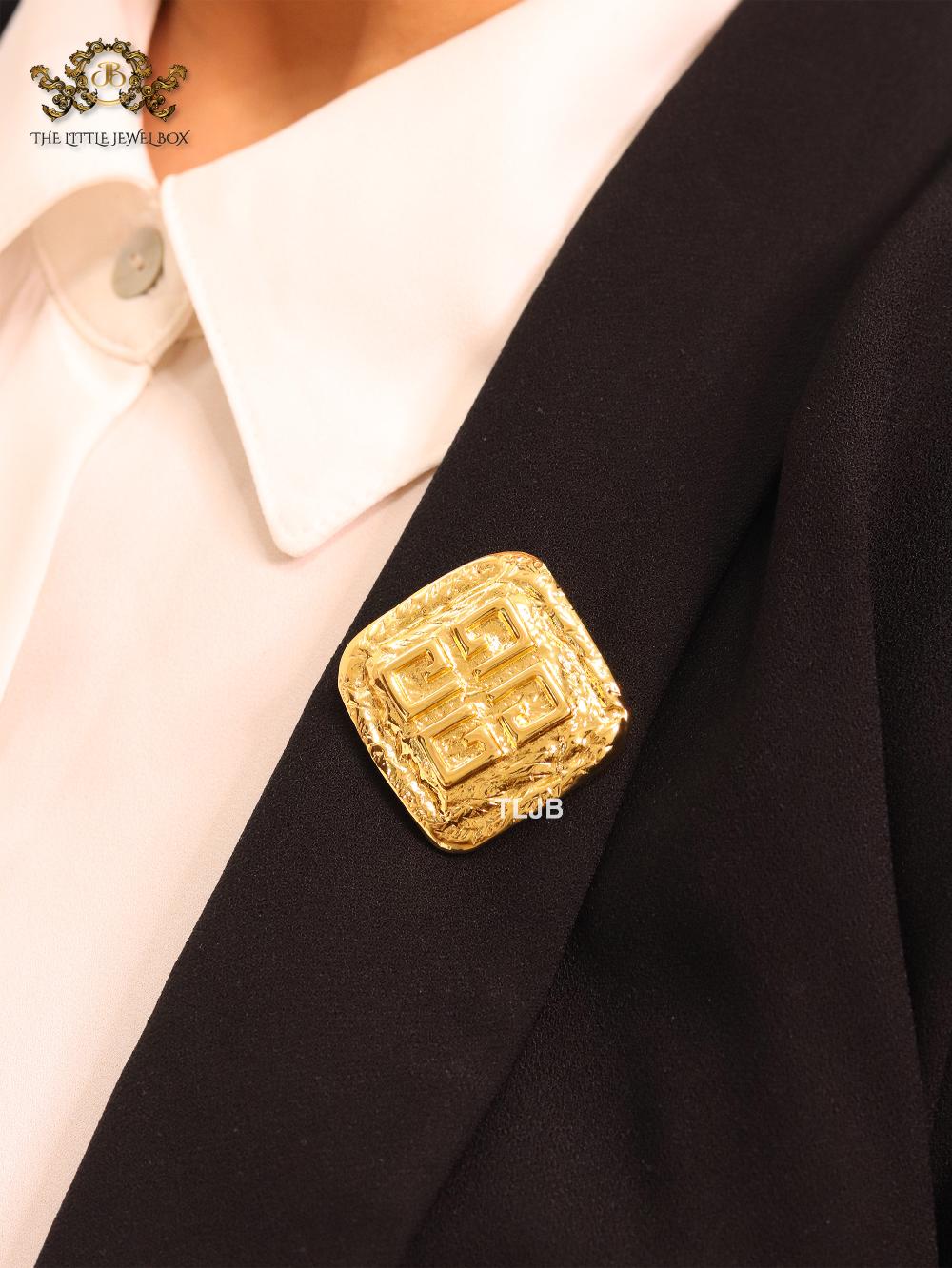 Small brass gold brooch