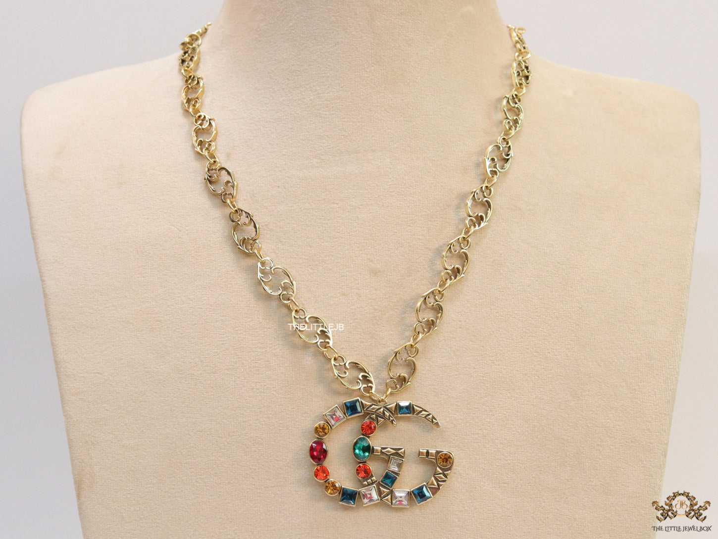 Golden fancy link chain necklace with multi cz twin G pendant