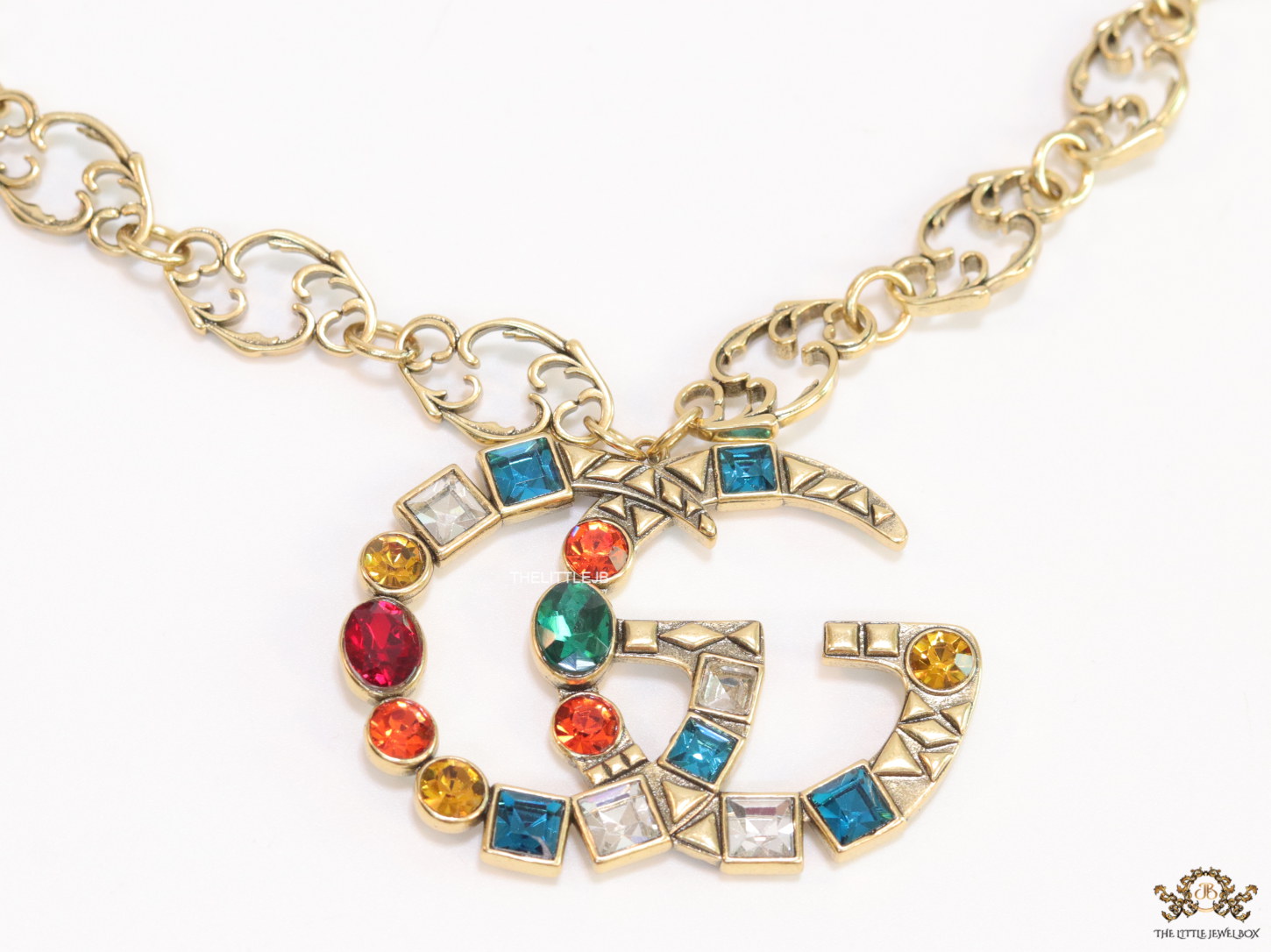 Golden fancy link chain necklace with multi cz twin G pendant