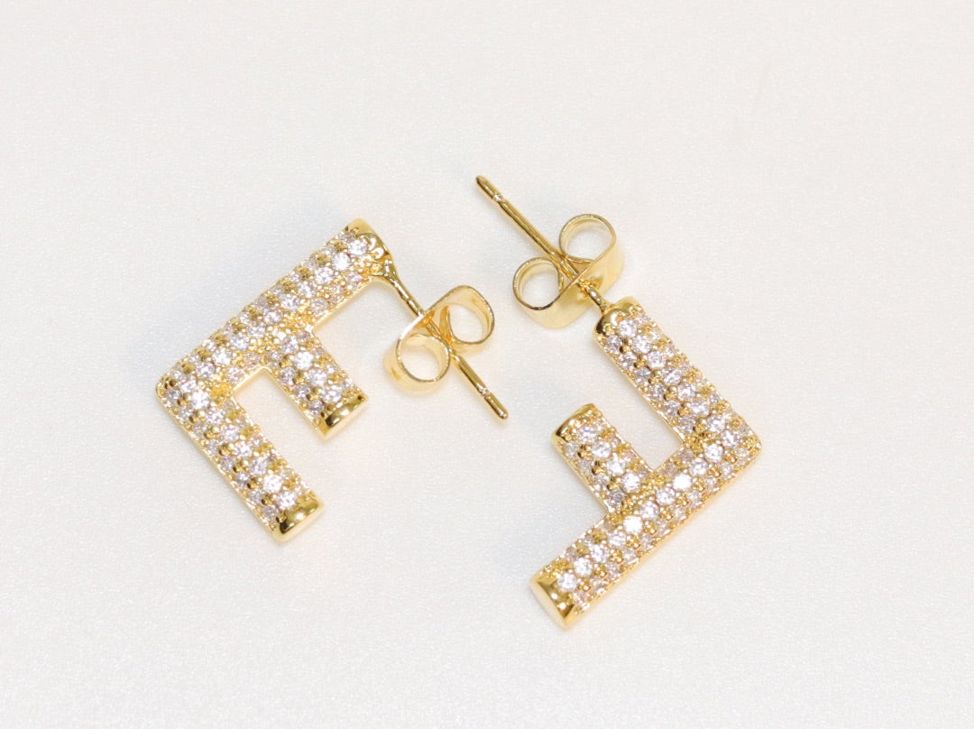 Alphabet F cz earrings in gold finish