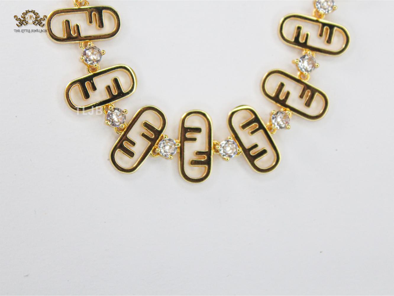 Alphabet F studded gold bracelet