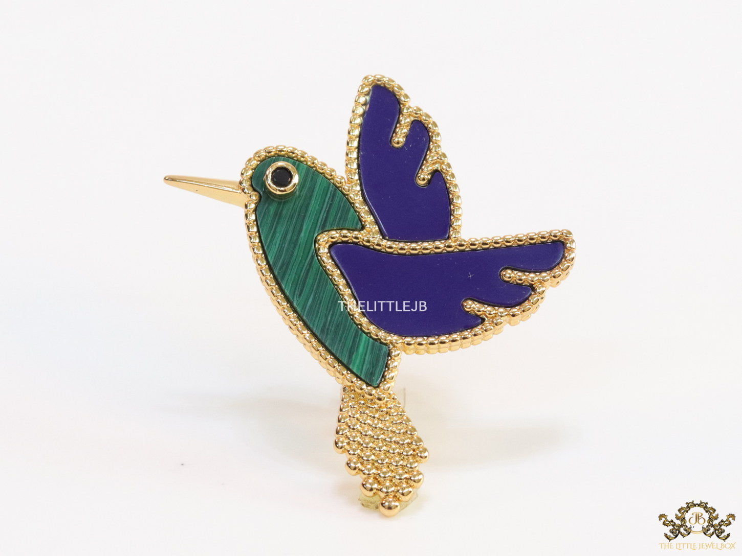 Gold plated multi-colour flying bird brooch