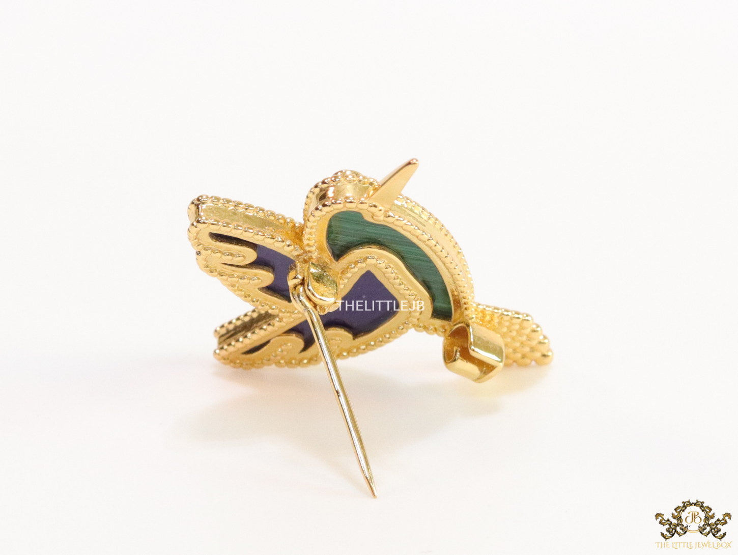 Gold plated multi-colour flying bird brooch