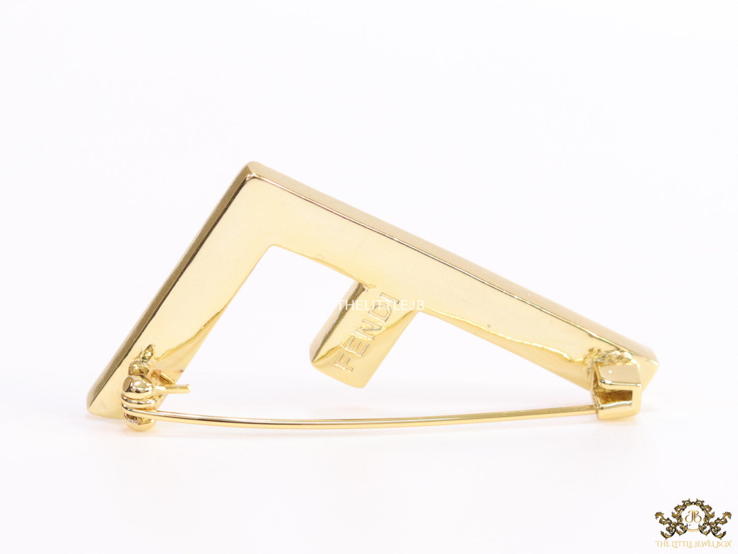 Gold plated alphabet F brooch with baguette cubic zirconia stone