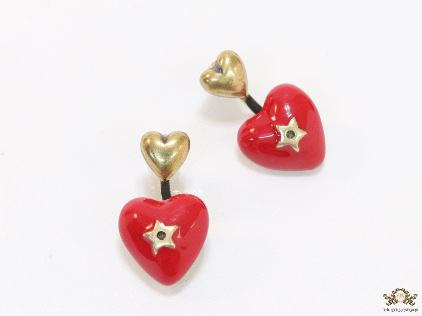 Golden and red detachable studs with twin hearts
