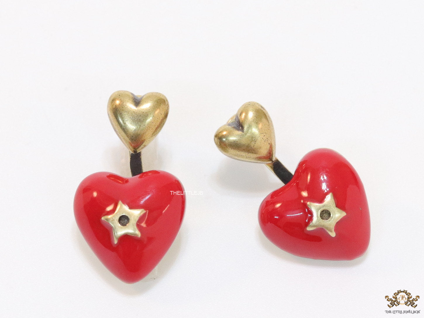 Golden and red detachable studs with twin hearts