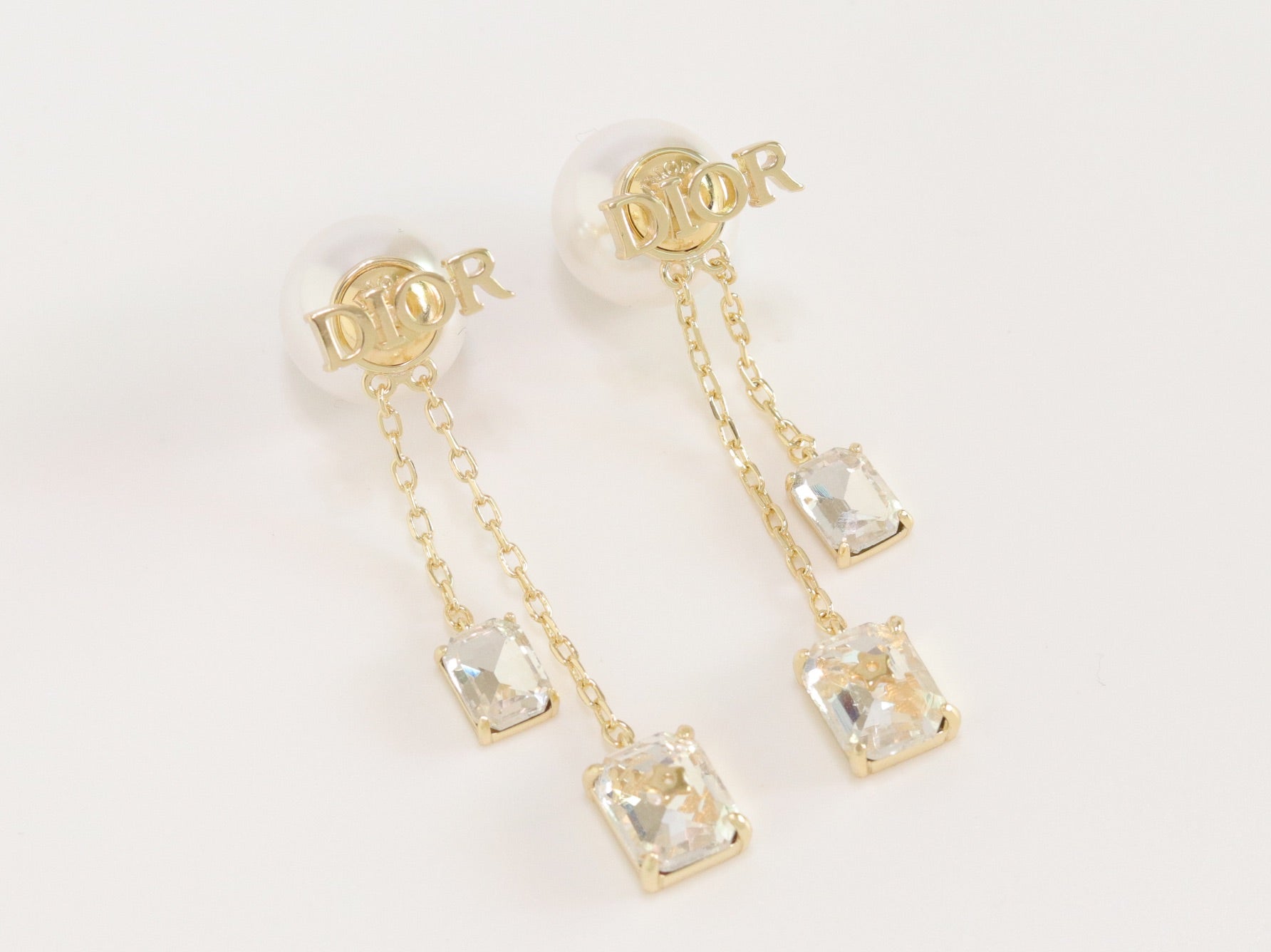 Alphabet C and D dangling pearl studs with CZ